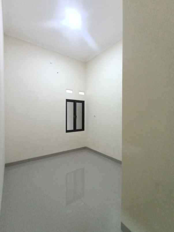 dijual rumah pesona anggrek harapan bekasi