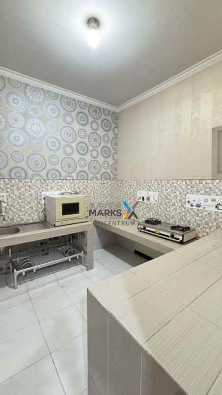 disewakan rumah di dharmahusada mas full furnished