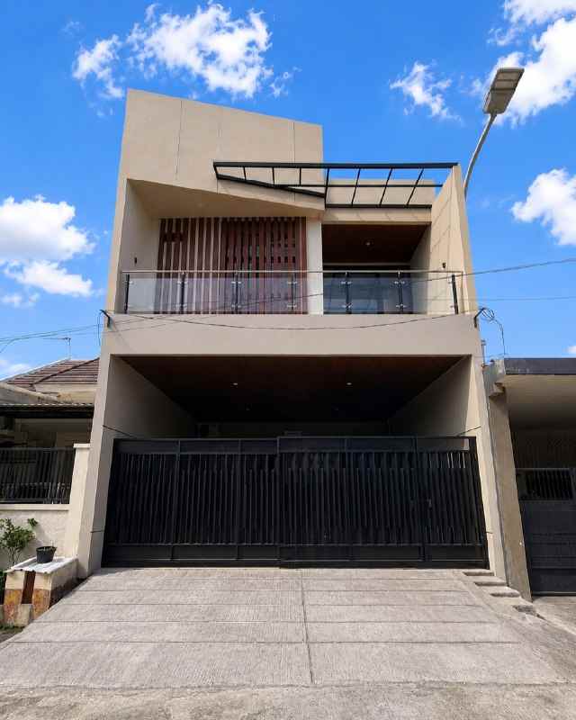 rumah babatan pantai new minimalis carport 2