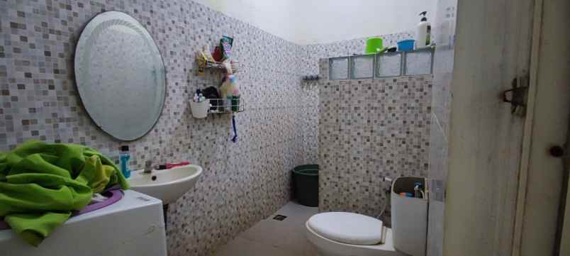 rumah jl binong kelapa dua