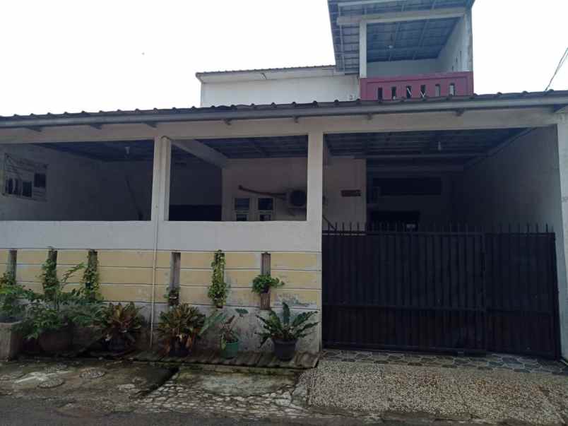 rumah jl binong kelapa dua
