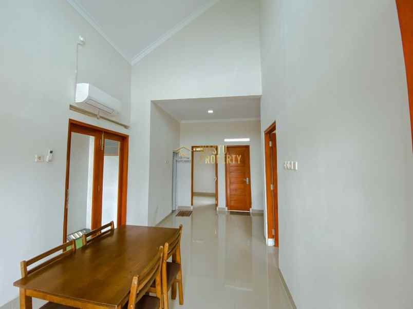 rumah siap huni dengan rooftop dekat gkj tulung