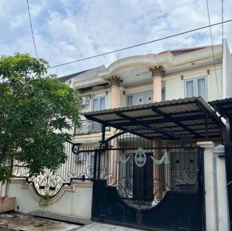 rumah wiguna timur hadap utara