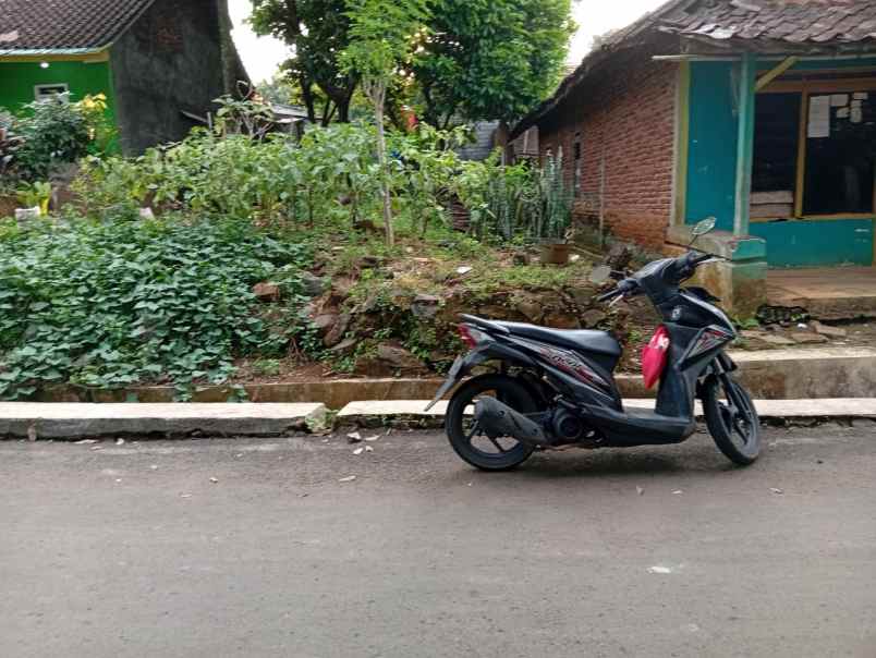 tanah kampung pinggir aspal
