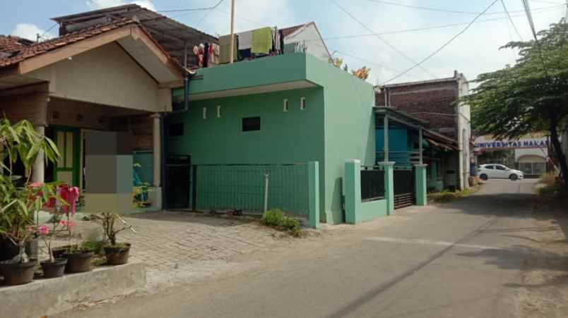 dijual rumah jl raden patah