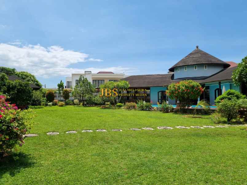 dijual rumah komplek graha helvetia