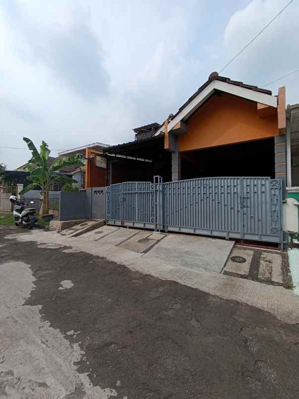 dijual rumah perumahan kalibaru permai