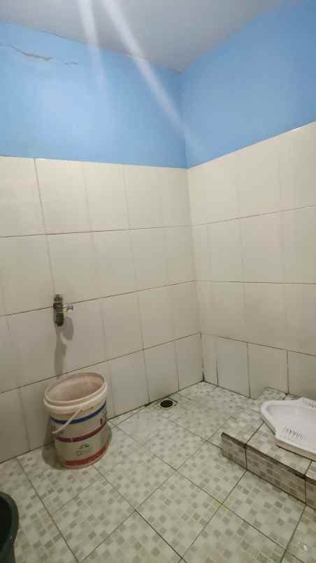 dijual rumah strategis sebrang jalan raya