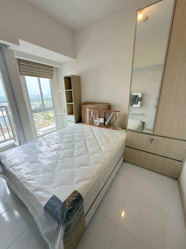 disewakan apartemen teluk naga