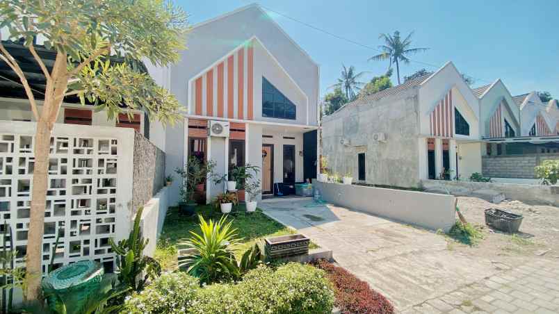 rumah dalam cluster one gate design scandinavian