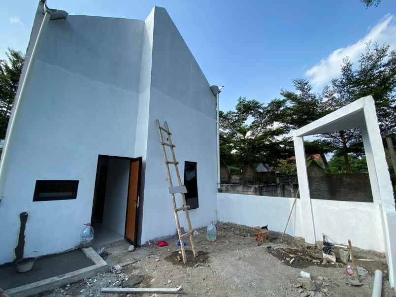 rumah dalam cluster one gate design scandinavian