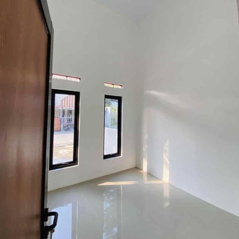 rumah dalam cluster one gate design scandinavian