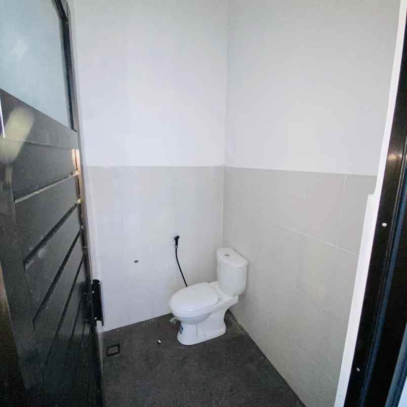 rumah dalam cluster one gate design scandinavian