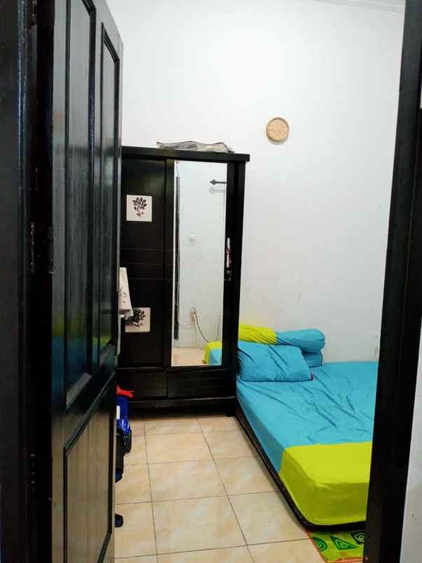 rumah jl pemuda sawangan baru