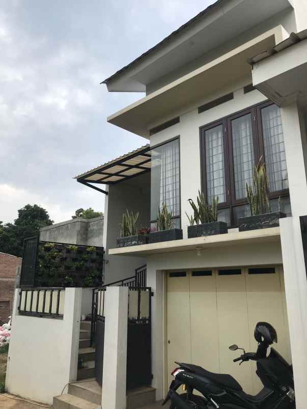 rumah minimalis cipageran bangunan baru siap huni