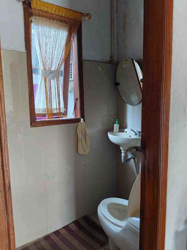 rumah siao huni dinding bata merah di cipayung depok