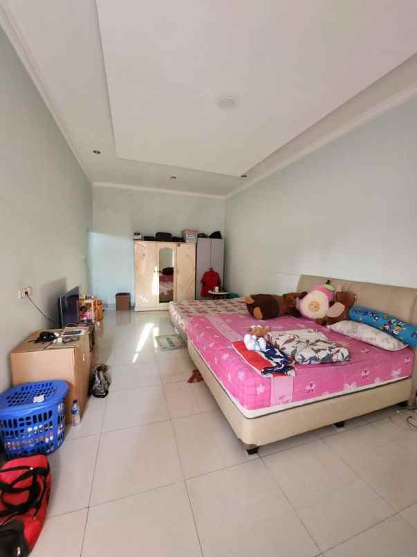 dijual rumah di taman harapan baru bekasi b0422