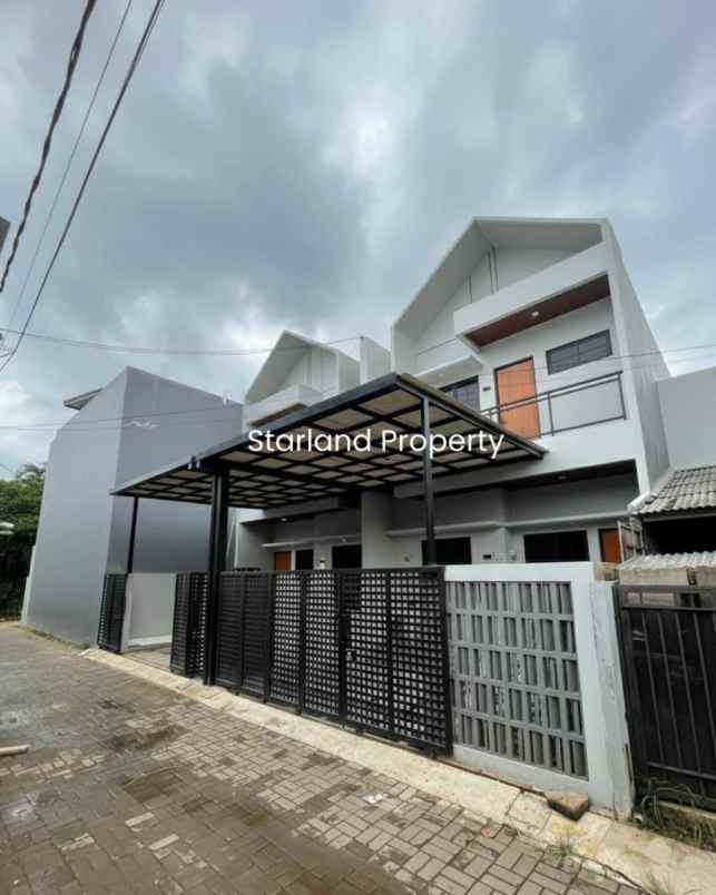 dijual rumah graha raya