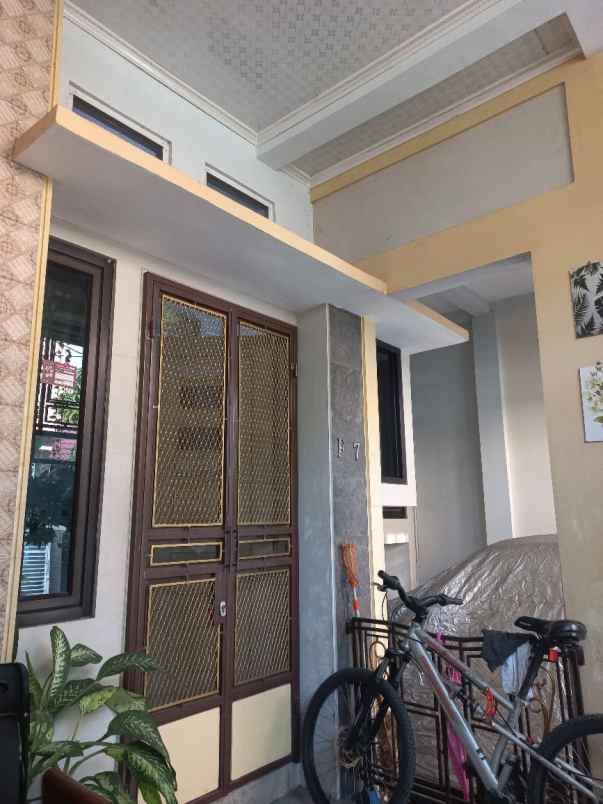 dijual rumah jalan raya mustikajaya