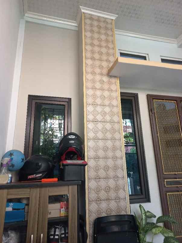 dijual rumah jalan raya mustikajaya