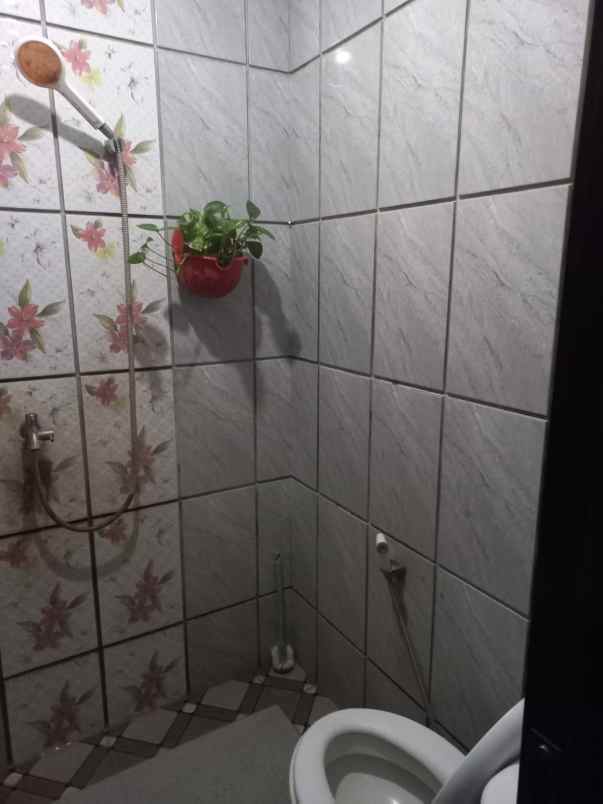 dijual rumah jalan raya mustikajaya