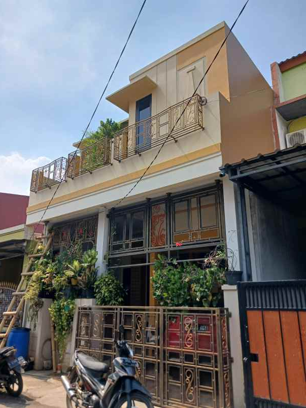 dijual rumah jalan raya mustikajaya