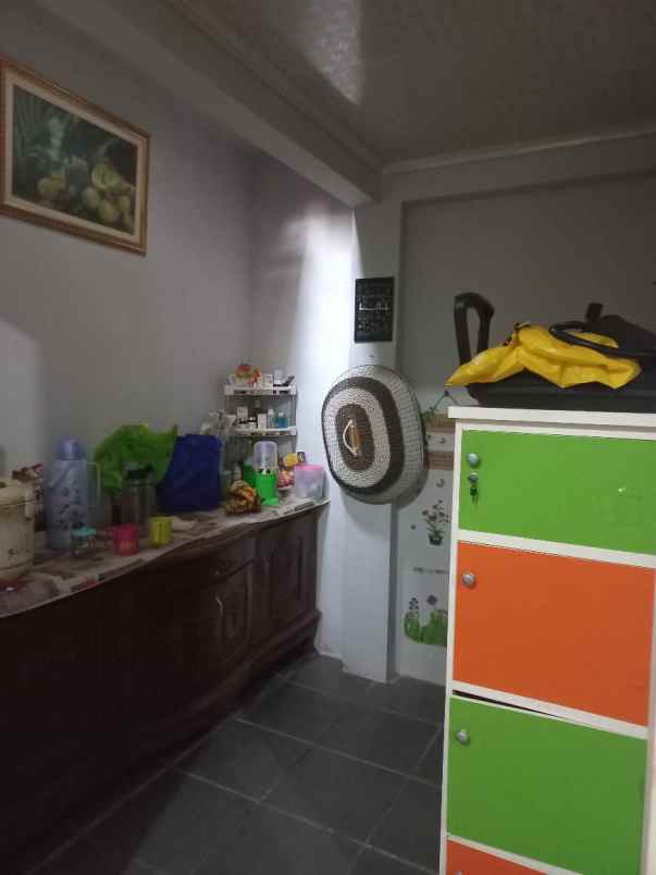 dijual rumah jalan raya mustikajaya