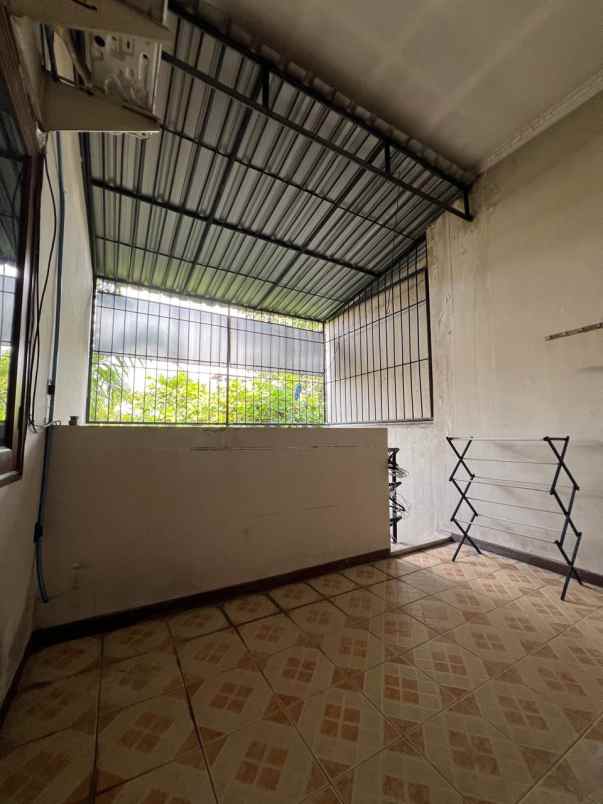 dijual rumah lebak indah regency