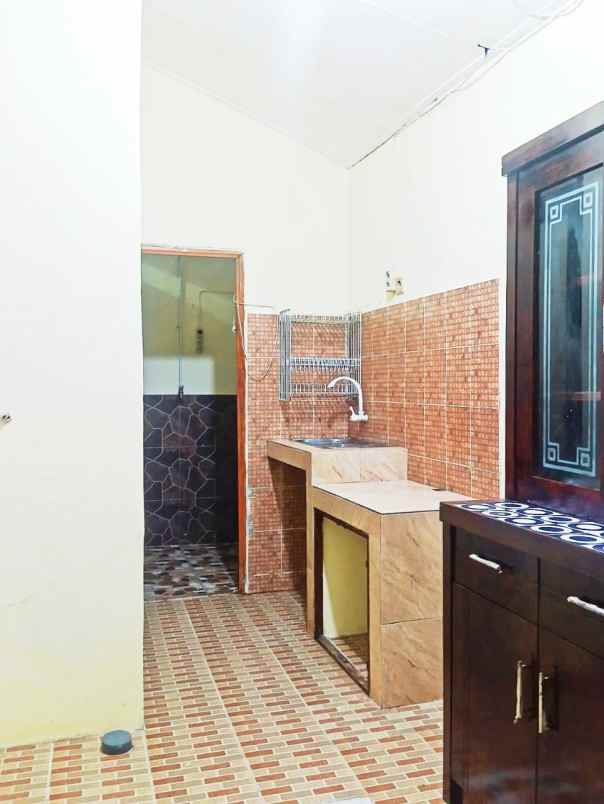 dijual rumah perum taman sawangan