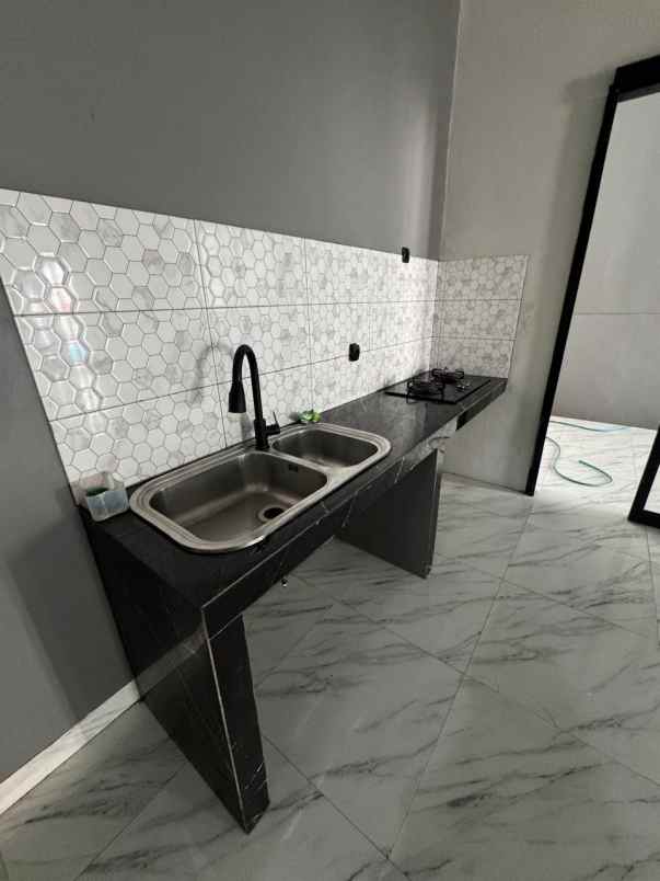 dijual rumah rangkapan jaya pancoran