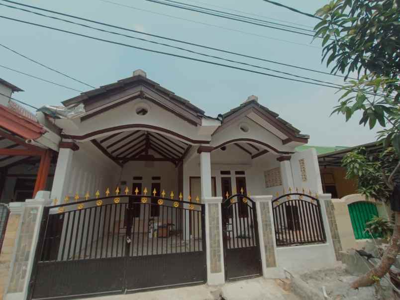 dijual rumah taman harapan baru