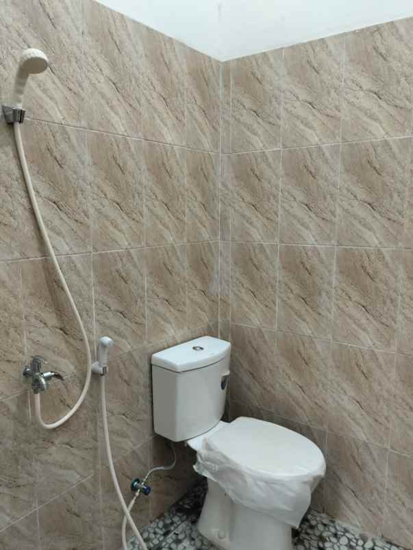 dijual rumah taman harapan baru