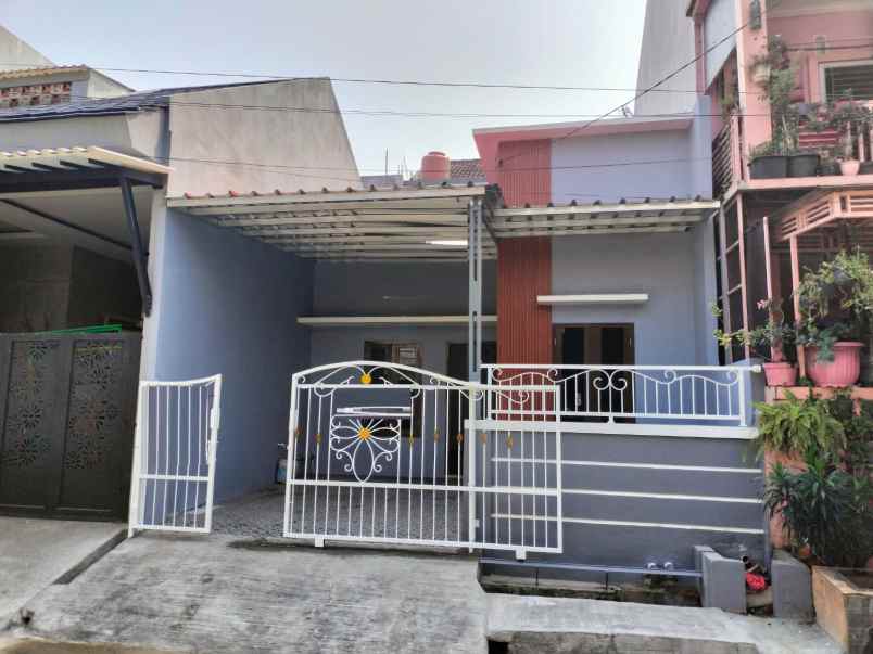 dijual rumah taman harapan baru