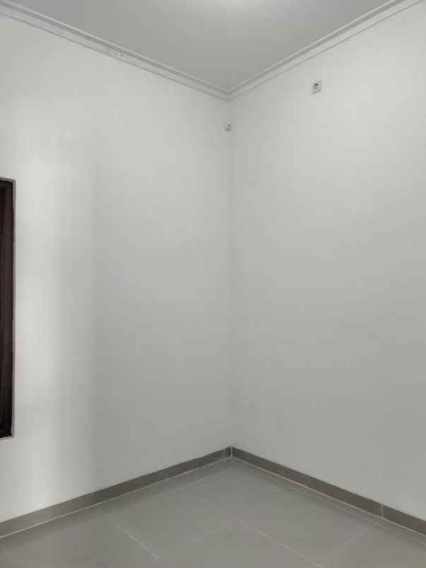 dijual rumah taman harapan baru