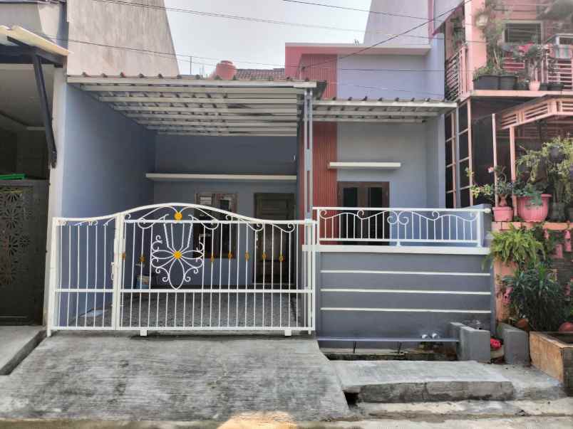 dijual rumah taman harapan baru