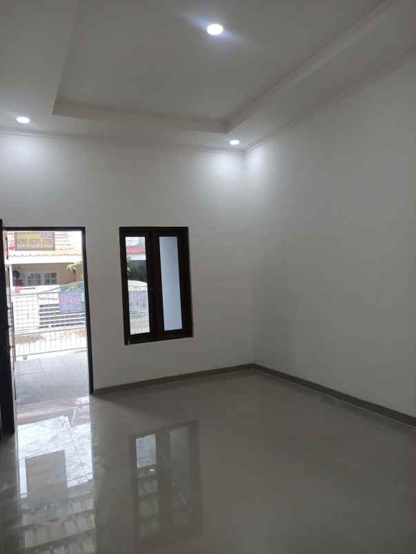 dijual rumah taman harapan baru kota