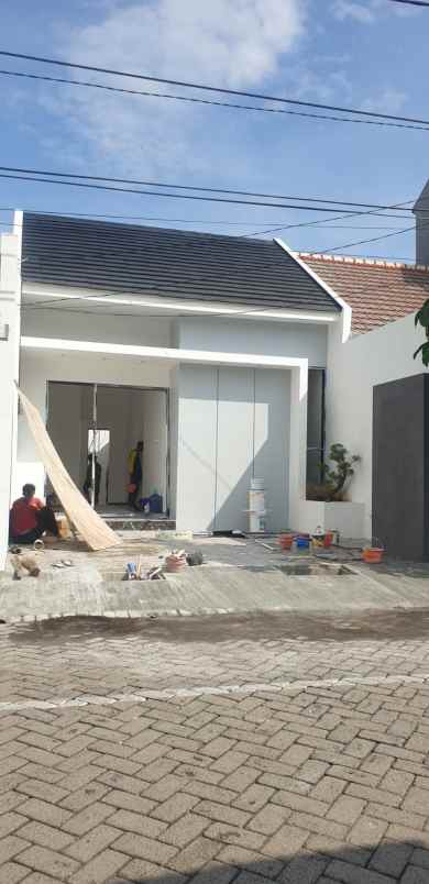dijual rumah wiguna