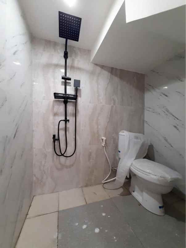 jual rugi rumah cluster mewah di tanah baru beji depok