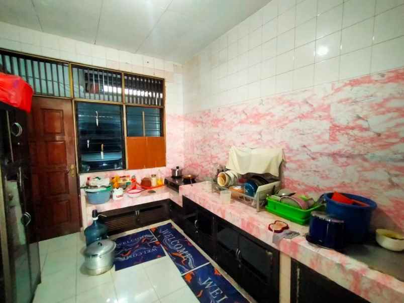 rumah raya sutorejo prima jalan kembar strategis