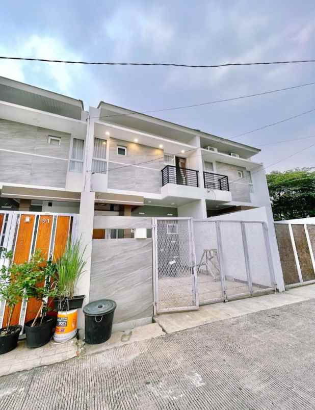 siap huni rumah cluster kota depok tole iskandar