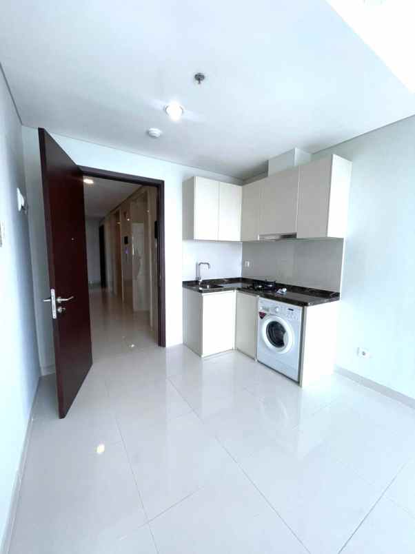 dijual rumah apartemen puri mansion