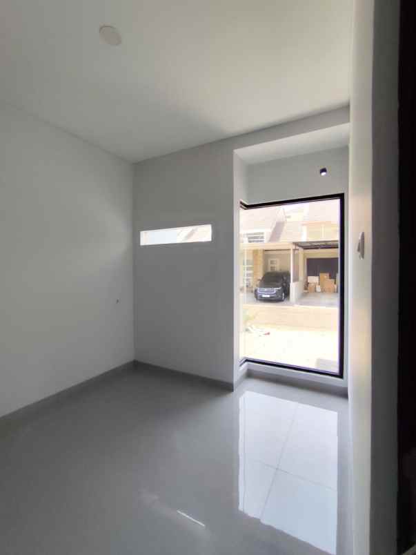 dijual rumah citraland raffles garden