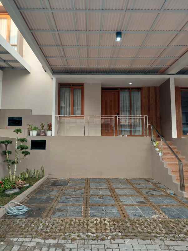dijual rumah cluster bali garden city