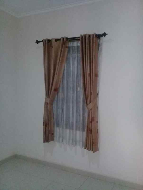 dijual rumah cluster madani regency