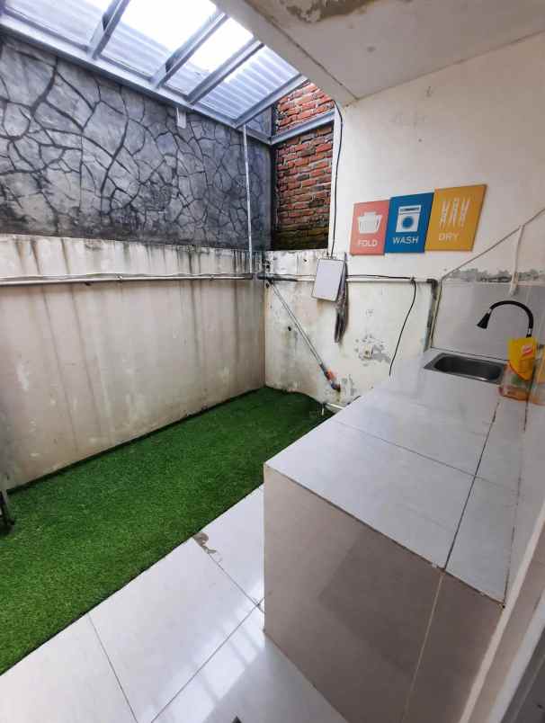 dijual rumah gardens sawangan