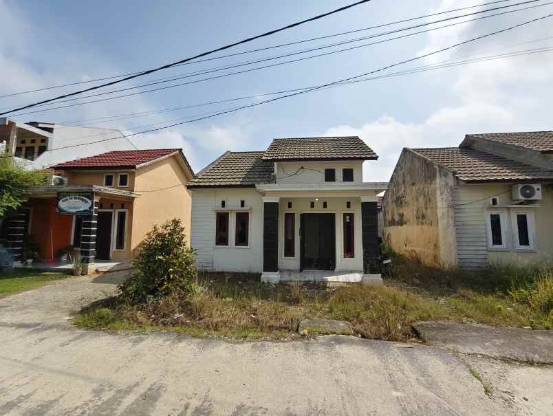 dijual rumah jl muhajirin