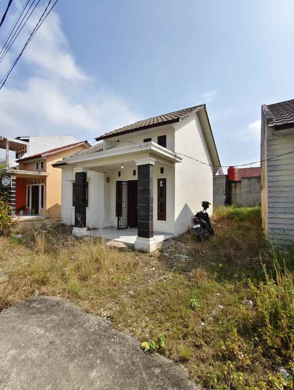 dijual rumah jl muhajirin