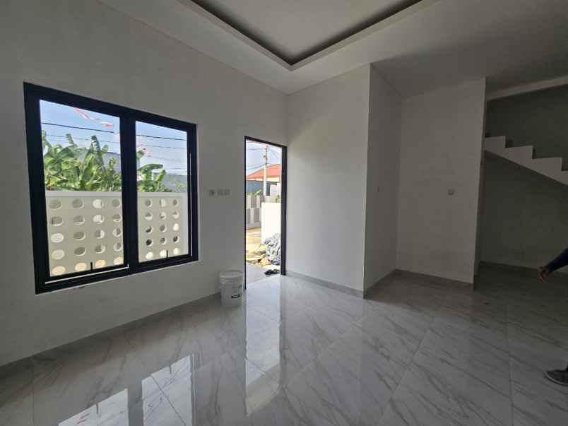 dijual rumah jl raya kalimulya cilodong