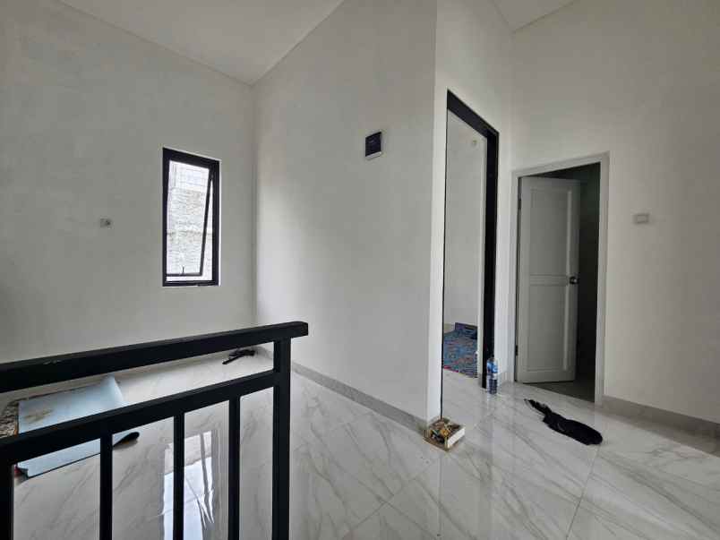 dijual rumah jl raya kalimulya cilodong