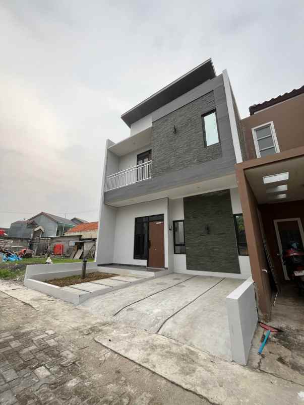 dijual rumah rawalumbu